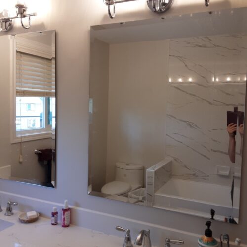 Reversible tub to shower conversion with low step entry for mobility friendly bathroom accessibility.