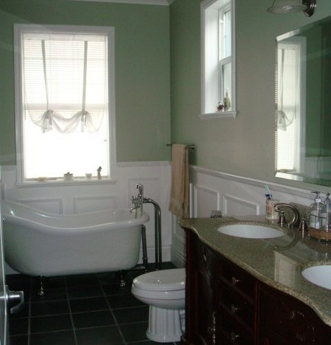 Reversible tub to shower conversion with low step entry for mobility friendly bathroom accessibility.