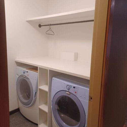 Reversible tub to shower conversion with low step entry for mobility friendly bathroom accessibility.