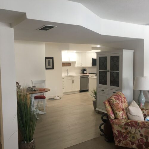 Reversible tub to shower conversion with low step entry for mobility friendly bathroom accessibility.