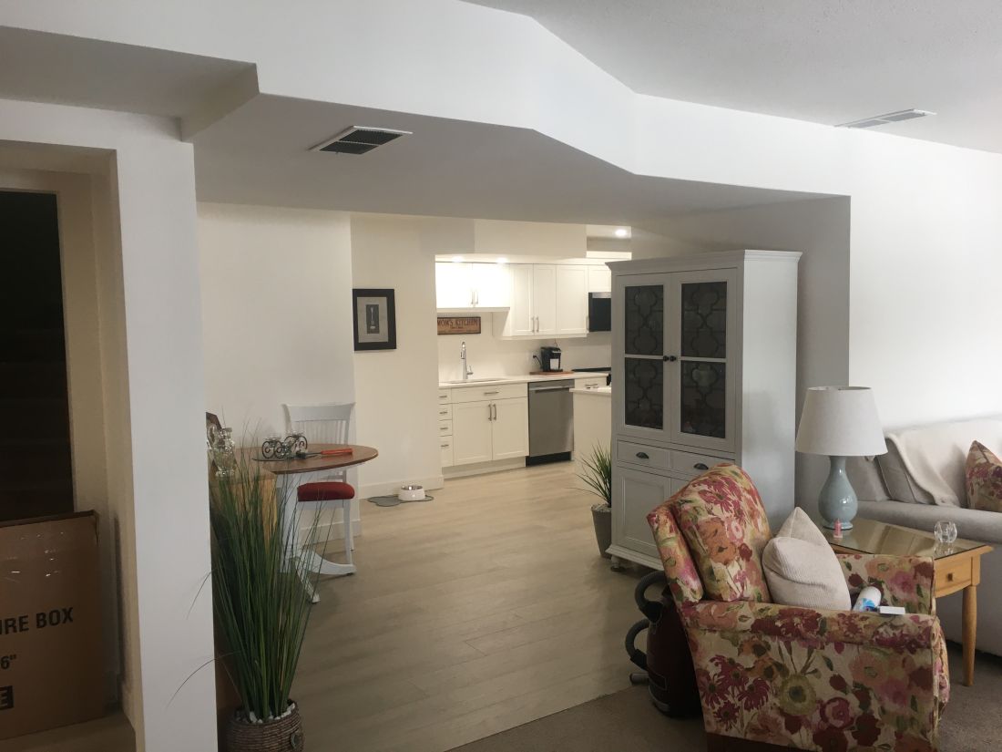 Reversible tub to shower conversion with low step entry for mobility friendly bathroom accessibility.