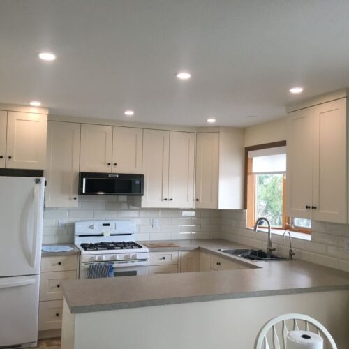 Reversible tub to shower conversion with low step entry for mobility friendly bathroom accessibility.