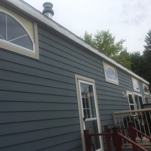 Reversible tub to shower conversion with low step entry for mobility friendly bathroom accessibility.