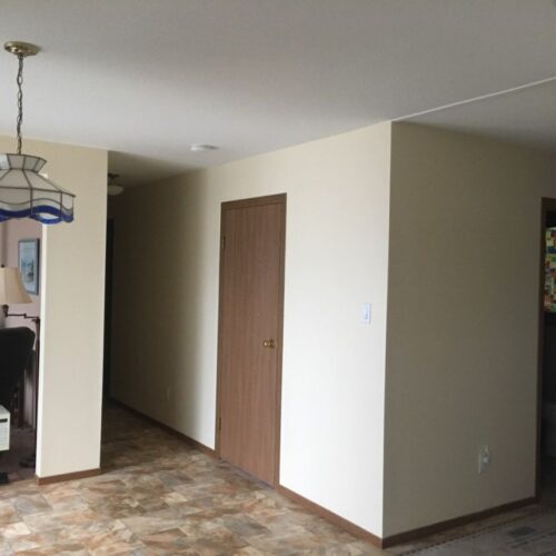 Reversible tub to shower conversion with low step entry for mobility friendly bathroom accessibility.